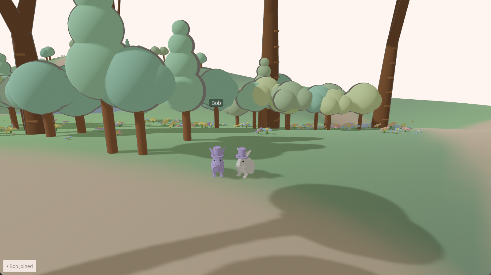 Two bunnies hanging out in the meadow